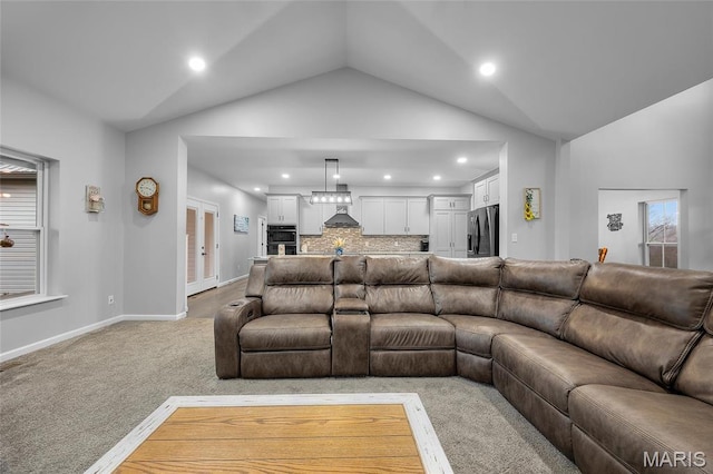 13160 Mammoth Rd, De Soto, MO 63020 - living room with vaulted ceiling, recessed lighting, and light carpet