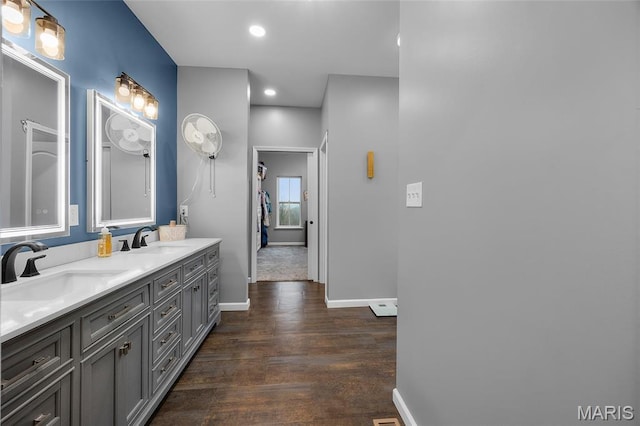13160 Mammoth Rd, De Soto, MO 63020 - bathroom with double vanity, wood finished floors, and recessed lighting