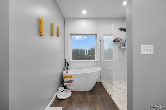 13160 Mammoth Rd, De Soto, MO 63020 - full bathroom with a soaking tub, wood finished floors, tiled shower, and recessed lighting