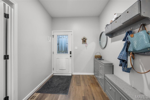 13160 Mammoth Rd, De Soto, MO 63020 - mudroom featuring wood finished floors and baseboards