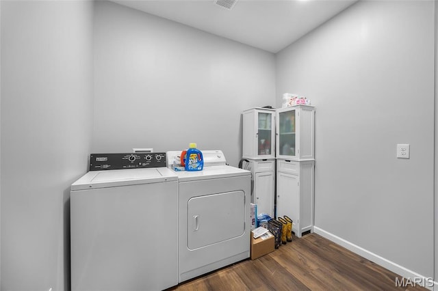 13160 Mammoth Rd, De Soto, MO 63020 - washroom featuring washer and clothes dryer and dark wood-type flooring