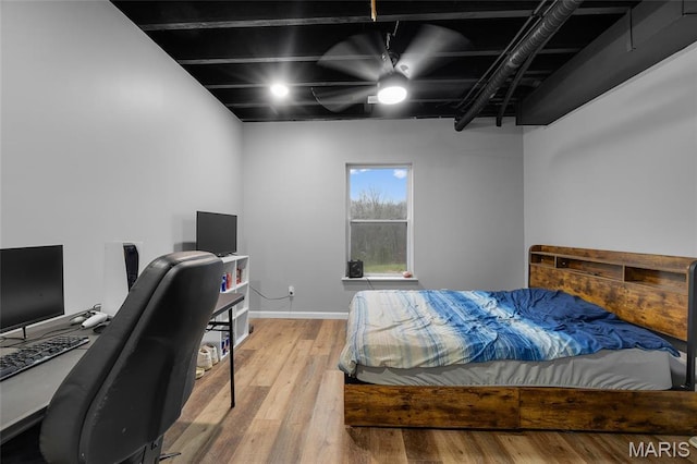 13160 Mammoth Rd, De Soto, MO 63020 - bedroom with a desk, wood finished floors, and ceiling fan