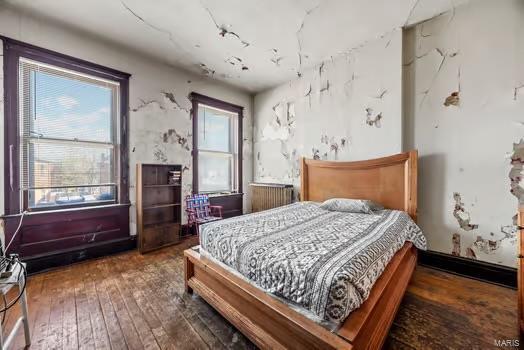2926 Dodier, Saint Louis, MO 63107 - bedroom with wood-type flooring
