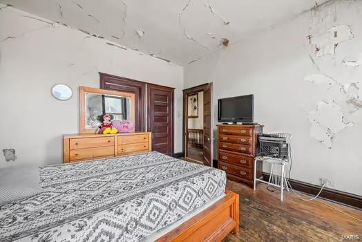 2926 Dodier, Saint Louis, MO 63107 - bedroom featuring wood finished floors