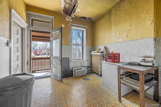 2926 Dodier, Saint Louis, MO 63107 - kitchen featuring radiator heating unit