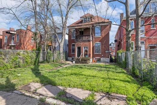 2926 Dodier, Saint Louis, MO 63107 - rear view of house with a balcony
