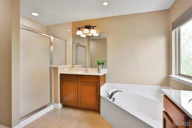 1304 Forest Way, Wentzville, MO 63385 - bathroom featuring vanity, a shower stall, a bath, and recessed lighting