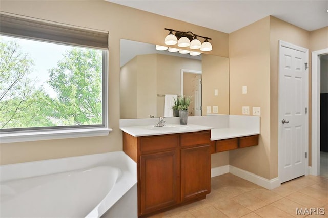 1304 Forest Way, Wentzville, MO 63385 - bathroom with vanity, a garden tub, tile patterned floors, and baseboards