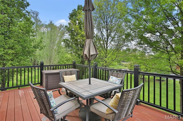 1304 Forest Way, Wentzville, MO 63385 - wooden terrace with outdoor dining area and a yard
