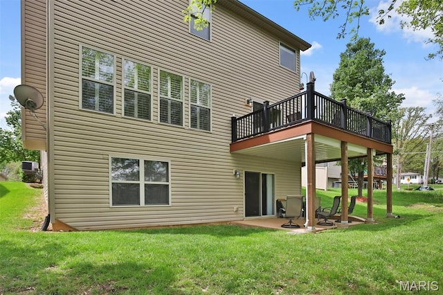 1304 Forest Way, Wentzville, MO 63385 - back of house with a lawn, a wooden deck, and a patio