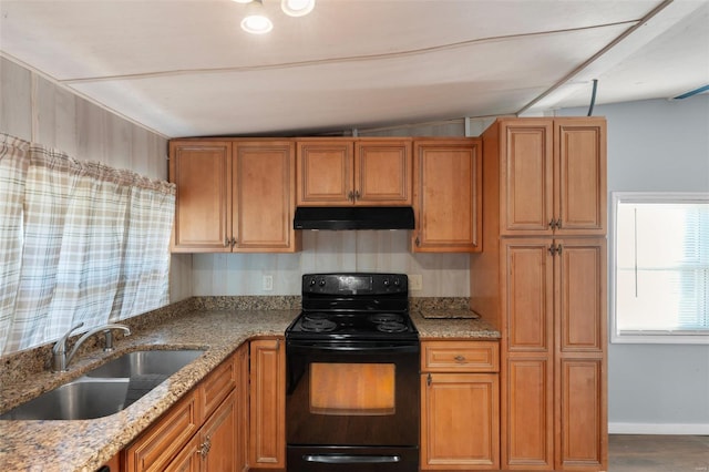 343 Del Vista Dr, Villa Ridge, MO 63089 - kitchen featuring black electric range, under cabinet range hood, a sink, light stone countertops, and brown cabinets