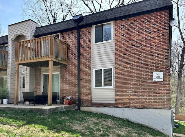 2804 Blackforest Dr Unit A, Saint Louis, MO 63129 - rear view of house with brick siding, a patio area, and a balcony