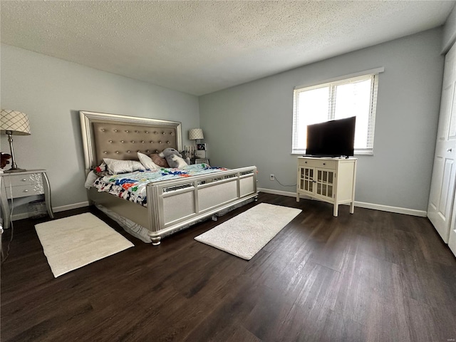 2804 Blackforest Dr Unit A, Saint Louis, MO 63129 - bedroom featuring wood finished floors, baseboards, and a textured ceiling