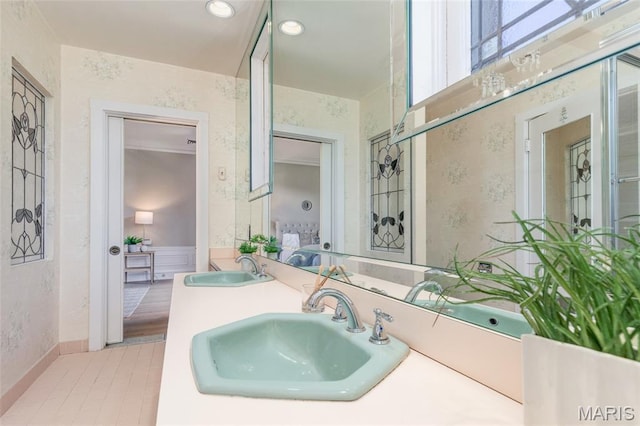 44 Kingsbury Pl, Saint Louis, MO 63112 - bathroom with double vanity and recessed lighting