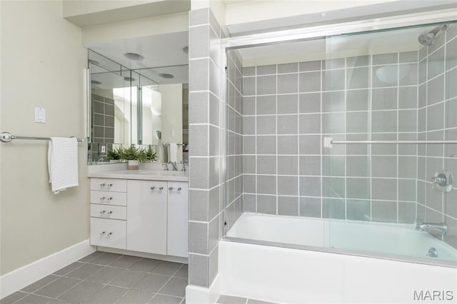 44 Kingsbury Pl, Saint Louis, MO 63112 - full bathroom with tile patterned flooring, shower / bath combination with glass door, baseboards, and vanity
