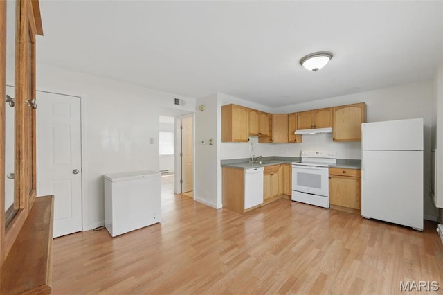10660 Carroll Wood Way, Saint Louis, MO 63128 - kitchen with white appliances, under cabinet range hood, light wood-type flooring, and a sink