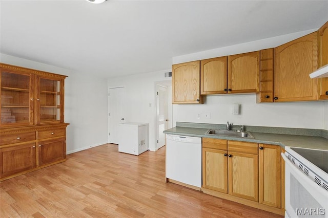 10660 Carroll Wood Way, Saint Louis, MO 63128 - kitchen featuring white appliances, a sink, and light wood finished floors
