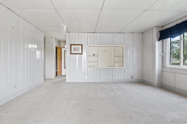 8934 Litzsinger Rd, Saint Louis, MO 63144 - empty room featuring carpet flooring and wood walls