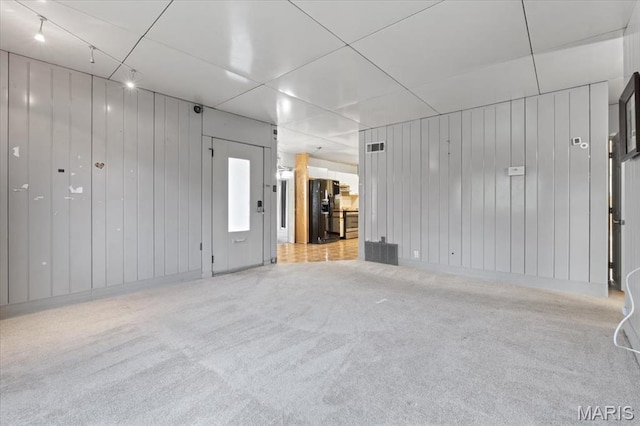 8934 Litzsinger Rd, Saint Louis, MO 63144 - unfurnished living room featuring carpet