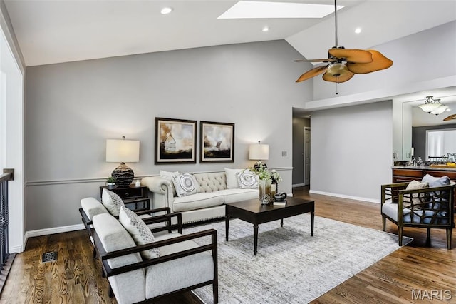 2113 Fairway Bnd, Chesterfield, MO 63017 - living area featuring high vaulted ceiling, a skylight, baseboards, ceiling fan, and wood finished floors
