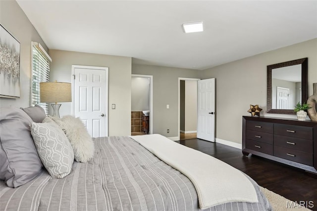 2113 Fairway Bnd, Chesterfield, MO 63017 - bedroom featuring dark wood-style flooring and baseboards