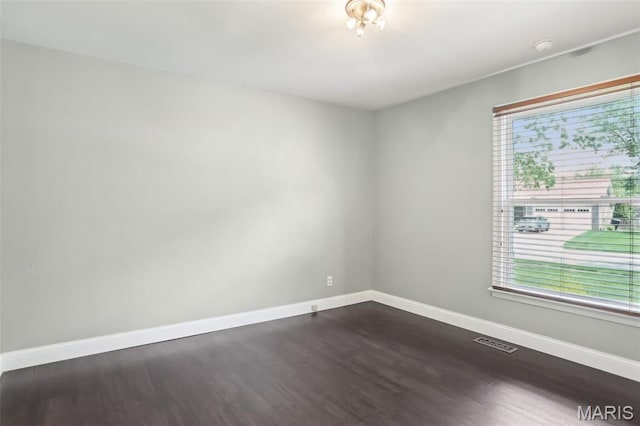 2113 Fairway Bnd, Chesterfield, MO 63017 - empty room with baseboards and dark wood-style floors