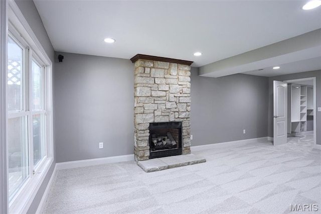 2113 Fairway Bnd, Chesterfield, MO 63017 - unfurnished living room featuring carpet, baseboards, a stone fireplace, and recessed lighting