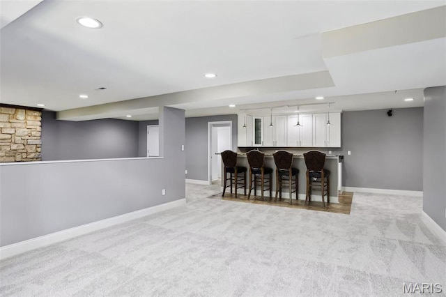 2113 Fairway Bnd, Chesterfield, MO 63017 - indoor bar featuring light colored carpet, recessed lighting, and baseboards