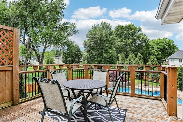 2113 Fairway Bnd, Chesterfield, MO 63017 - wooden deck with outdoor dining space
