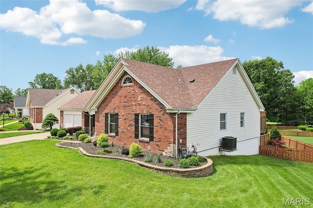 2113 Fairway Bnd, Chesterfield, MO 63017 - view of front of house featuring brick siding, a shingled roof, central air condition unit, and driveway