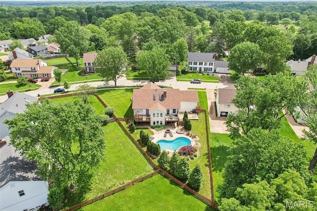 2113 Fairway Bnd, Chesterfield, MO 63017 - aerial perspective of suburban area with a pool area and a forest