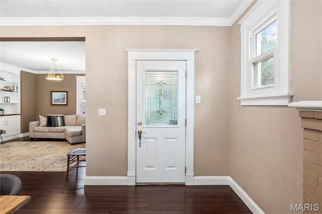 2521 High School Dr, Saint Louis, MO 63144 - entrance foyer featuring dark wood-style floors, crown molding, and baseboards