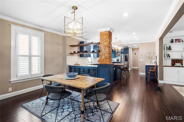 2521 High School Dr, Saint Louis, MO 63144 - dining space with a chandelier, ornate columns, crown molding, dark wood-style floors, and baseboards