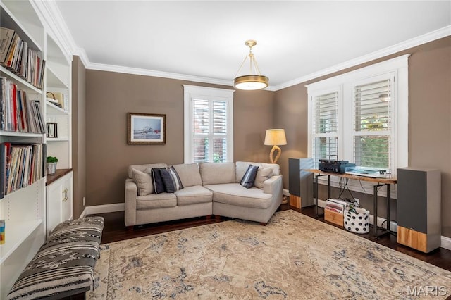 2521 High School Dr, Saint Louis, MO 63144 - living area featuring wood finished floors, ornamental molding, and baseboards