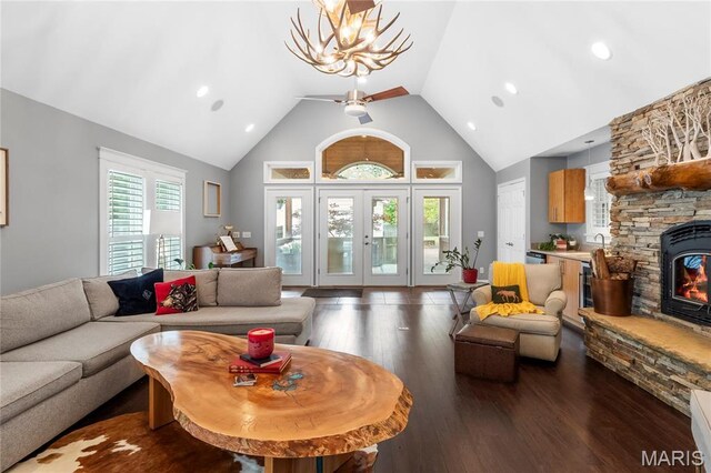 2521 High School Dr, Saint Louis, MO 63144 - living room with wood finished floors, high vaulted ceiling, a ceiling fan, recessed lighting, and french doors