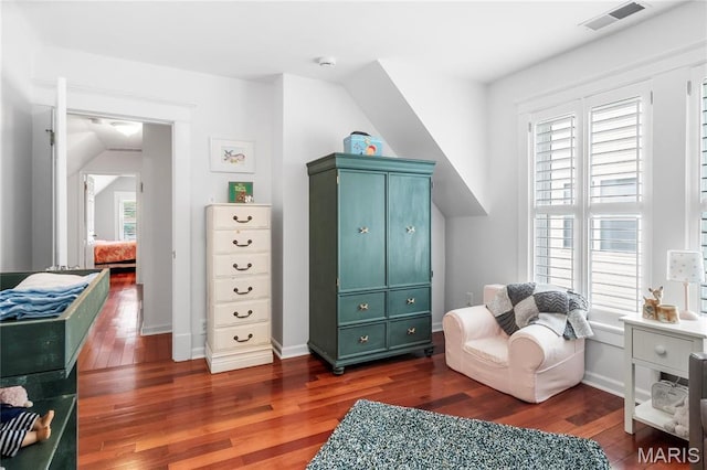 2521 High School Dr, Saint Louis, MO 63144 - sitting room featuring wood finished floors, plenty of natural light, and baseboards