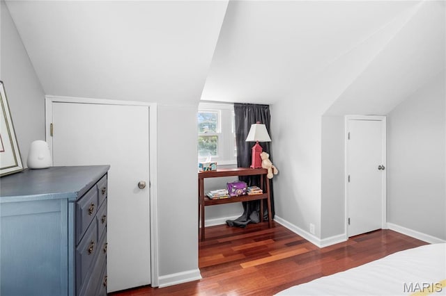 2521 High School Dr, Saint Louis, MO 63144 - bedroom with wood finished floors, lofted ceiling, and baseboards