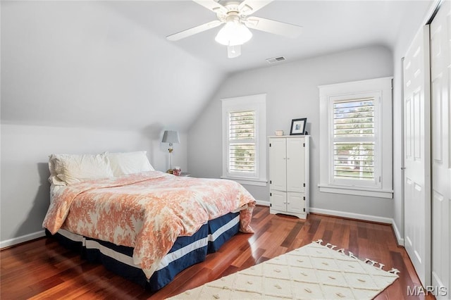 2521 High School Dr, Saint Louis, MO 63144 - bedroom featuring vaulted ceiling, wood finished floors, baseboards, a ceiling fan, and a closet