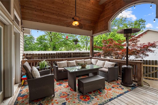 2521 High School Dr, Saint Louis, MO 63144 - deck with an outdoor living space, a fenced backyard, and a ceiling fan