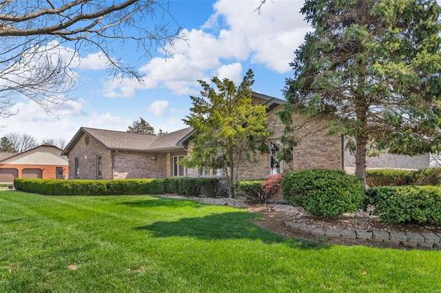 8620 State Route 163, Belleville, IL 62223 - view of side of home featuring brick siding and a lawn