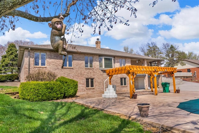 8620 State Route 163, Belleville, IL 62223 - back of house featuring a pergola, brick siding, a chimney, and a patio area