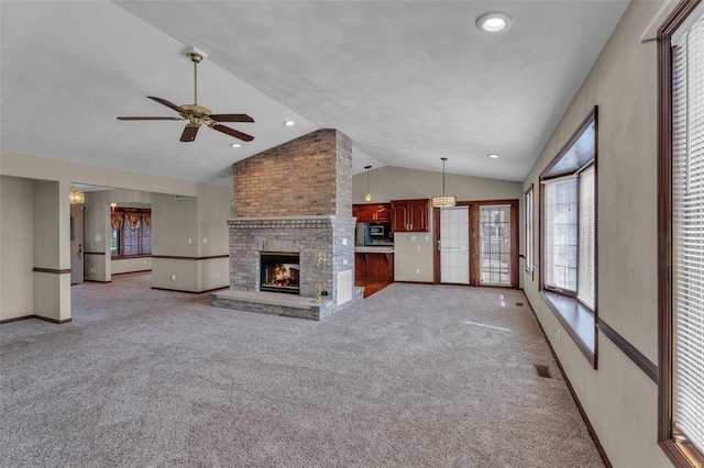 8620 State Route 163, Belleville, IL 62223 - unfurnished living room featuring lofted ceiling, light carpet, ceiling fan, baseboards, and a brick fireplace
