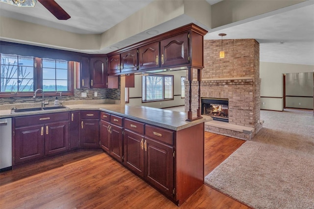 8620 State Route 163, Belleville, IL 62223 - kitchen featuring a sink, a peninsula, wood finished floors, and open floor plan