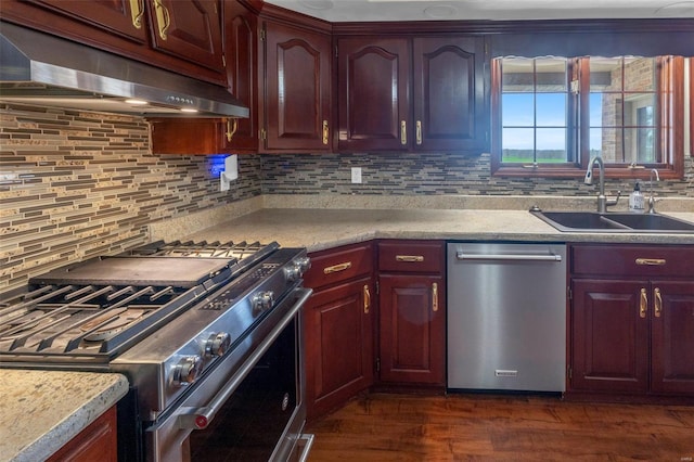 8620 State Route 163, Belleville, IL 62223 - kitchen with appliances with stainless steel finishes, under cabinet range hood, a sink, and tasteful backsplash