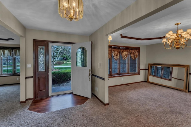 8620 State Route 163, Belleville, IL 62223 - entrance foyer with carpet floors, a chandelier, and baseboards