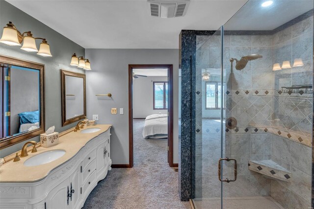8620 State Route 163, Belleville, IL 62223 - bathroom with connected bathroom, a tile shower, double vanity, and baseboards