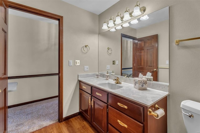 8620 State Route 163, Belleville, IL 62223 - half bath with wood finished floors, toilet, and vanity