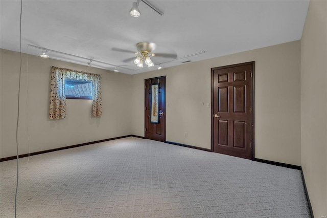 8620 State Route 163, Belleville, IL 62223 - unfurnished room with rail lighting, carpet, and ceiling fan