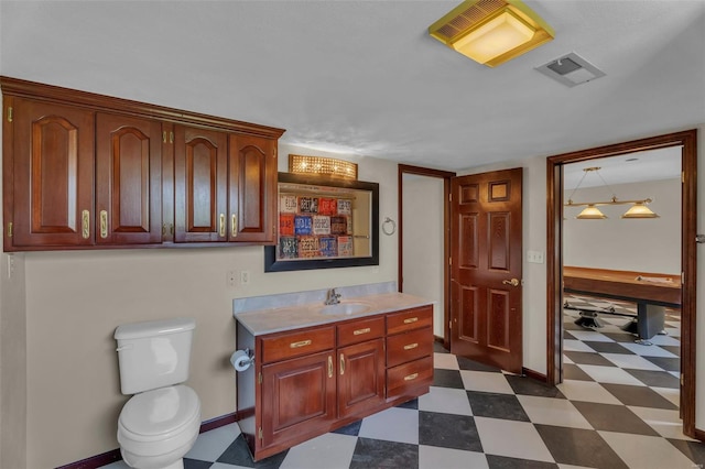 8620 State Route 163, Belleville, IL 62223 - bathroom with tile patterned floors, vanity, baseboards, and toilet