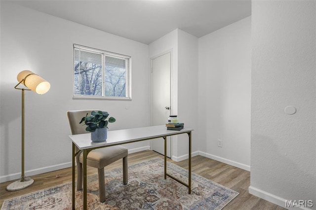 35 Florissant Park Dr, Florissant, MO 63031 - office area featuring wood finished floors and baseboards